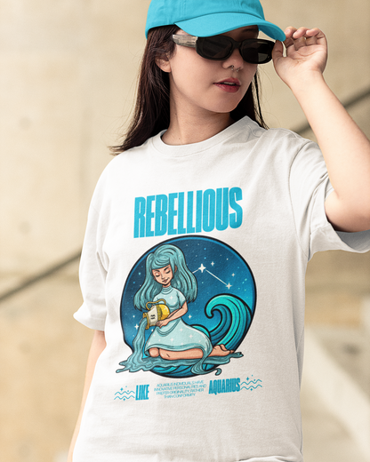Person wearing a white t-shirt with a graphic design and text 'REBELLIOUS' on a blurred background