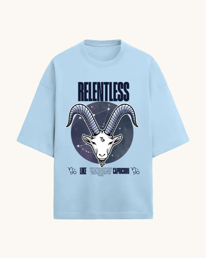 Light blue t-shirt with Capricorn zodiac design and 'RELENTLESS' text on a white background