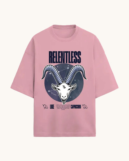 Pink t-shirt with Capricorn zodiac design and 'RELENTLESS' text on a white background