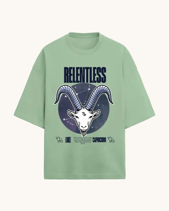 Light green t-shirt with Capricorn zodiac design and 'RELENTLESS' text on a white background
