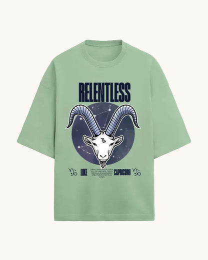 Light green t-shirt with Capricorn zodiac design and 'RELENTLESS' text on a white background
