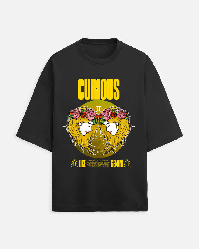Black t-shirt with a graphic design featuring a face with flowers and the word 'Curious' on a white background.