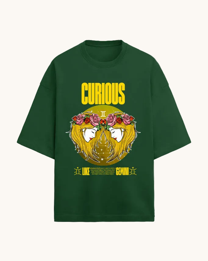 Green t-shirt with a graphic design featuring a face with flowers and the word 'Curious' on a white background.