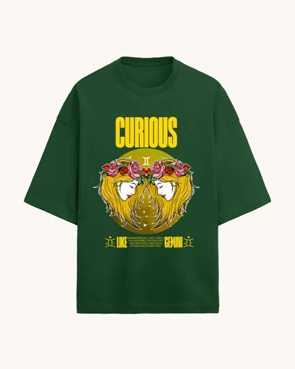Green t-shirt with a graphic design featuring a face with flowers and the word 'Curious' on a white background.